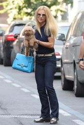 Michelle Hunziker - Carries Her Dog Lilly to a Media Appearance in Milan 9/2/2016