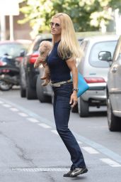 Michelle Hunziker - Carries Her Dog Lilly to a Media Appearance in Milan 9/2/2016