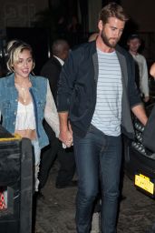 Miley Cyrus Holding Onto Liam Hemsworth