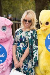 Pamela Anderson - Poses With PETA