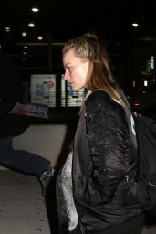 Margot Robbie Wears a Cry Baby Jacket - Arrives at JFK Airport in New York 