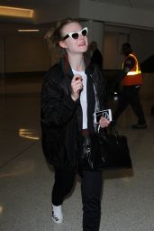 Elle Fanning at LAX Airport in Los Angeles 12/8/ 2016 