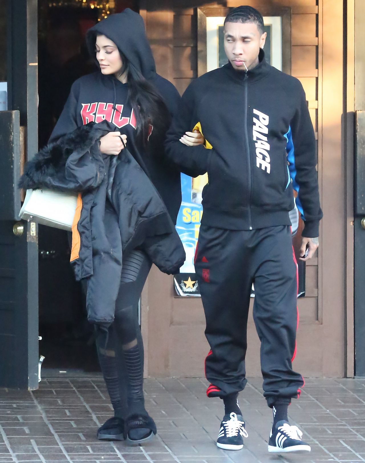 Kylie Jenner and Tyga - Leave a Restaraunt in Los Angeles 12/18/ 2016 ...