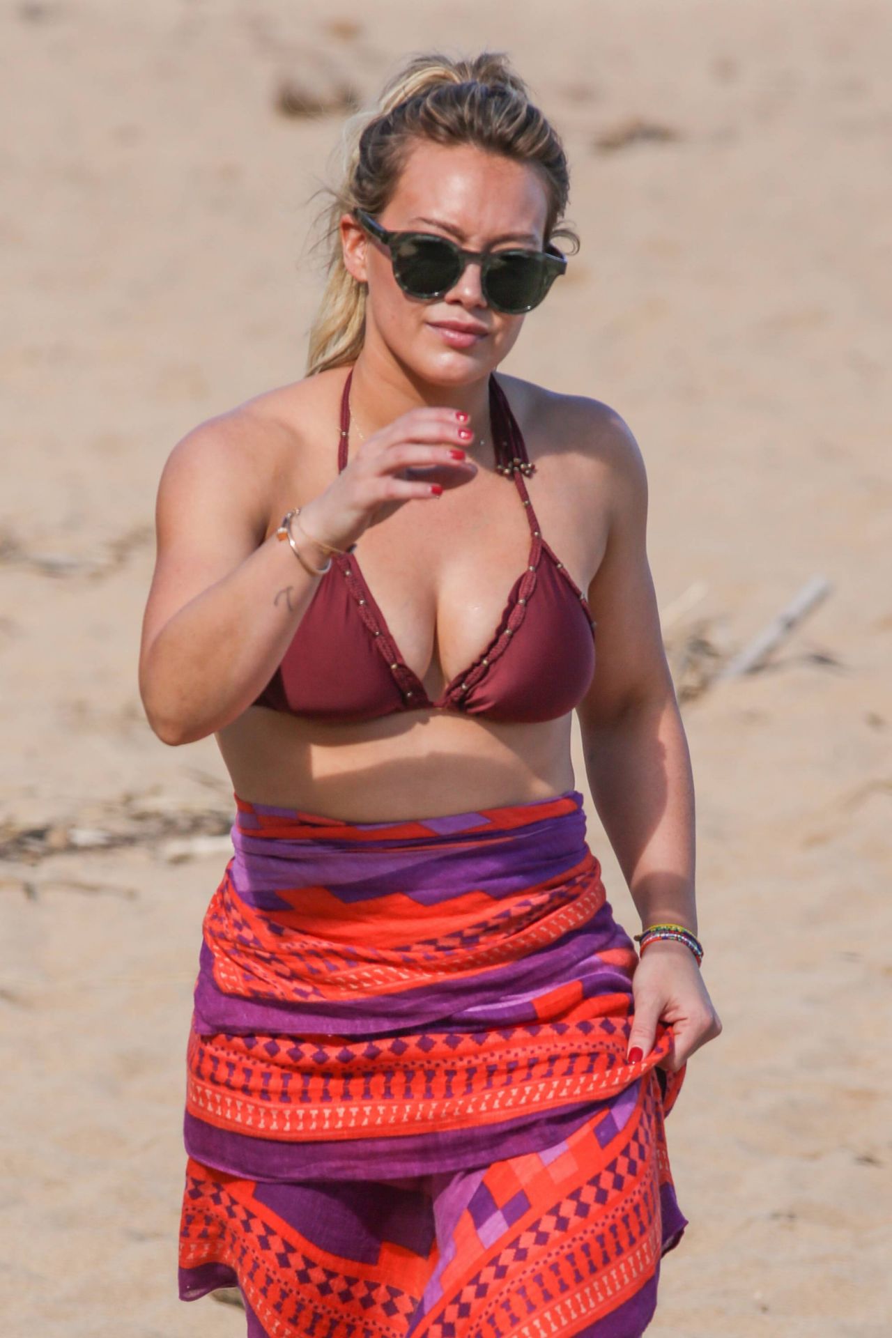Hilary Duff in Bikini at the Beach in Hawaii 1/1/ 2017.