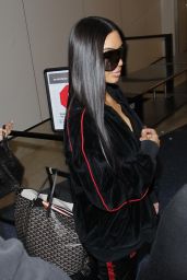 Kim Kardashian - Taking a Flight Out of LAX Airport Los Angeles 1/11/ 2017