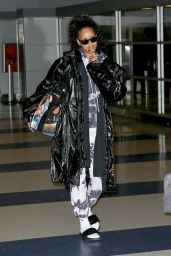 Rihanna Plays Coy With the Cameras - Arrives to JFK Airport from London 1/2/ 2017