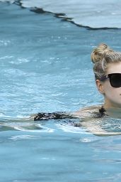 Charlotte McKinney - Relaxes Poolside in Miami, Florida 2/18/ 2017