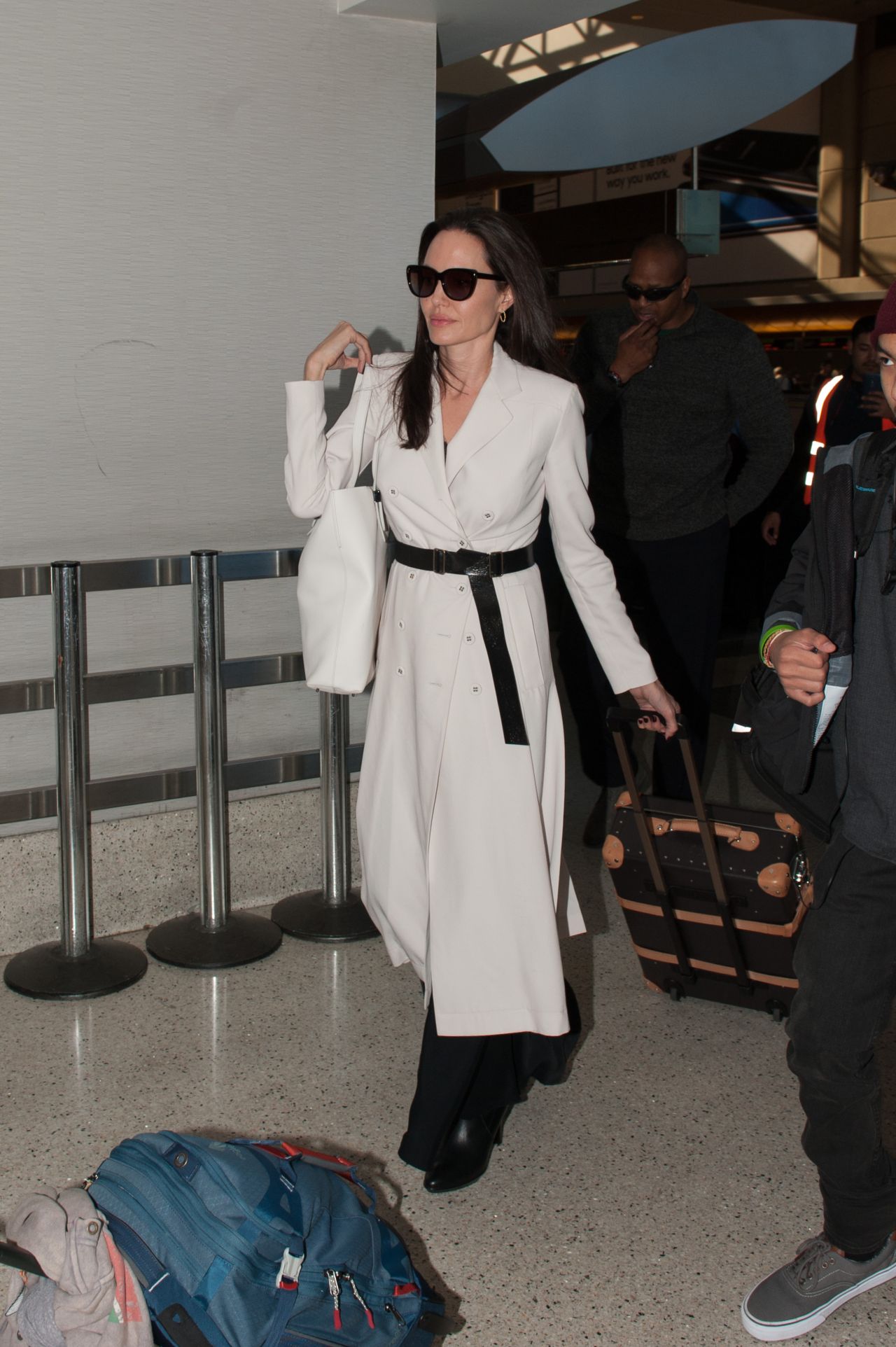 Angelina Jolie - Arriving to Los Angeles International Airport 3/11 ...
