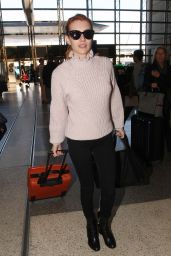 Emma Roberts - Arriving at Paris CDG Airport for Fashion Week 3/1/ 2017
