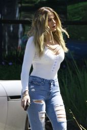 Khloe Kardashian in Ripped Jeans Leaving a Studio in Calabasas 3/29/2017
