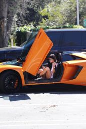 Kylie Jenner Stepping Out of Her Orange Lamborghini Aventador Roadster - Los Angeles 03/11/ 2017