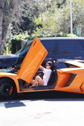 Kylie Jenner Stepping Out of Her Orange Lamborghini Aventador Roadster - Los Angeles 03/11/ 2017
