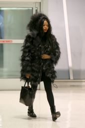 Naomi Campbell Keeps Warm in a Large Fur Coat - JFK AIrport in NY 3/11/ 2017
