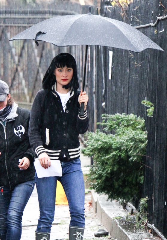 Olivia Wilde Under an Umbrella Wearing a Black Wig on the "Life Itself" 3/28/2017