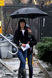 Olivia Wilde Under an Umbrella Wearing a Black Wig on the "Life Itself" 3/28/2017