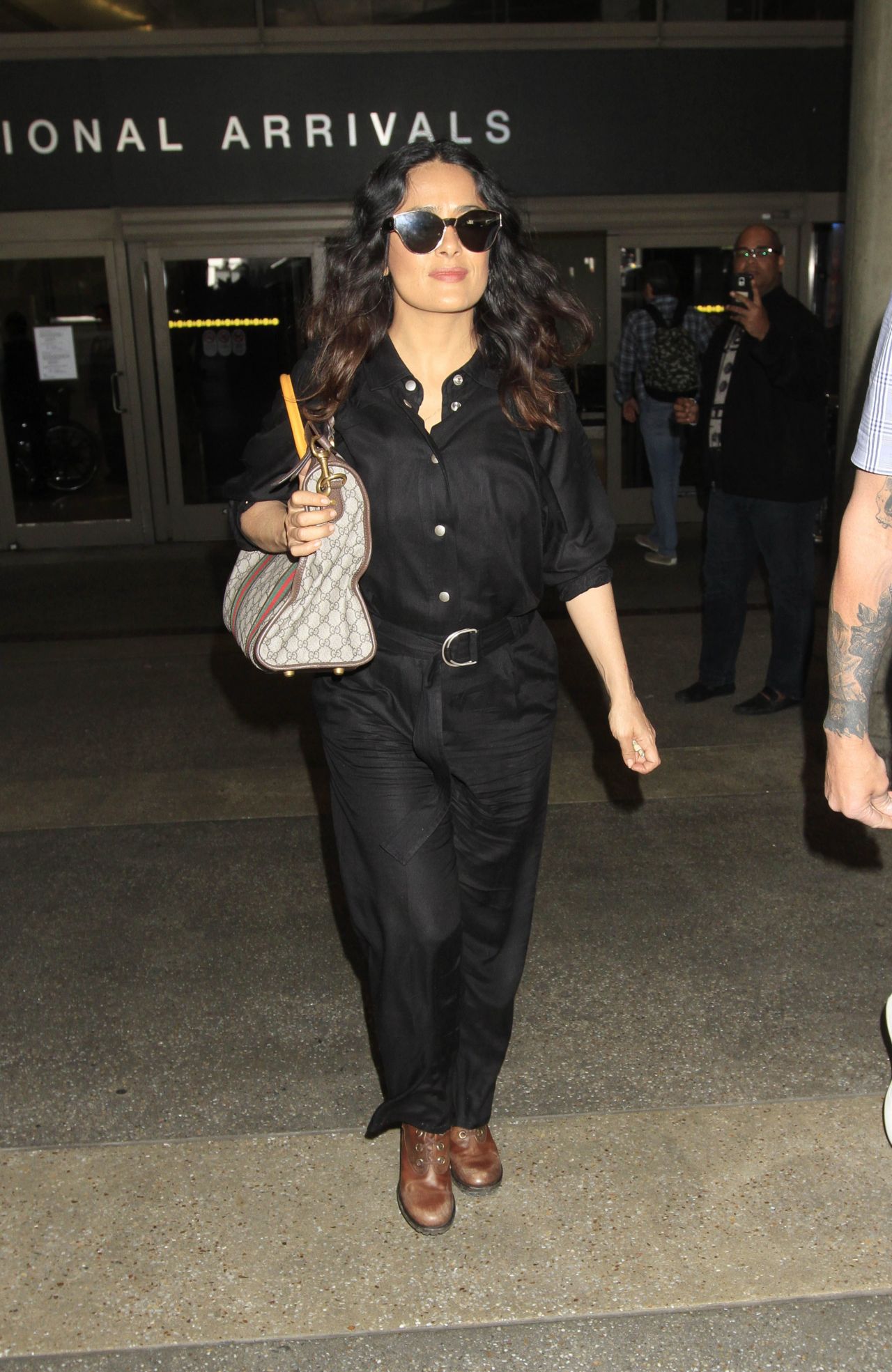 Salma Hayek Dressed in a Black Jumpsuit - Arrives in LA 3/28/2017