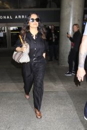 Salma Hayek Dressed in a Black Jumpsuit  - Arrives in LA 3/28/2017 
