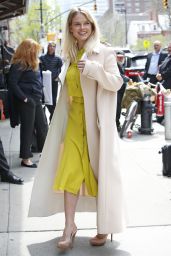 Alice Eve in a Lemon Colored Dress and Peach Coat - New York City 4/20/2017