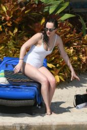 Dakota Johnson in White Swimsuit at a Beach in Miami 4/2/2017