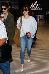 Emilia Clarke in Tight Jeans - Arriving at Heathrow Airport 4/20/2017