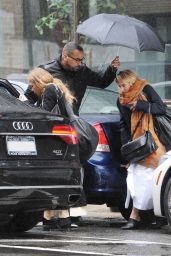 Mary-Kate Olsen and Ashley Olsen - Leaving office on Rainy Day in NYC 04/25/2017