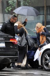 Mary-Kate Olsen and Ashley Olsen - Leaving office on Rainy Day in NYC 04/25/2017