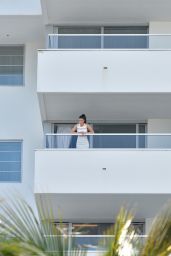 Alexandra Daddario at a Balcony in Miami, Florida 05/14/2017