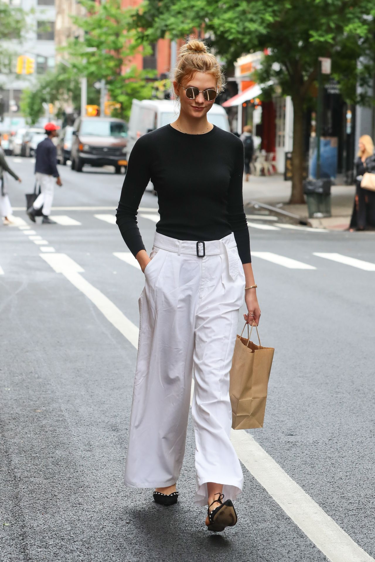 Karlie Kloss in White Pants - NYC 05/30/2017 • CelebMafia