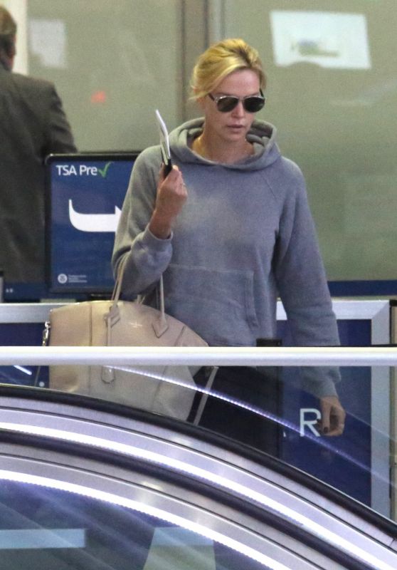 Charlize Theron - Catches an Early Morning Flight at LAX in LA 06/24/2017
