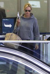 Charlize Theron - Catches an Early Morning Flight at LAX in LA 06/24/2017