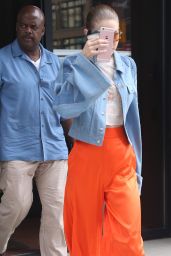Gigi Hadid - Wearing a Pair of Orange Trousers in NYC 06/19/2017