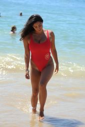 Casey Batchelor in a Red Swimsuit on a Beach Holiday in Portugal 07/29/2017