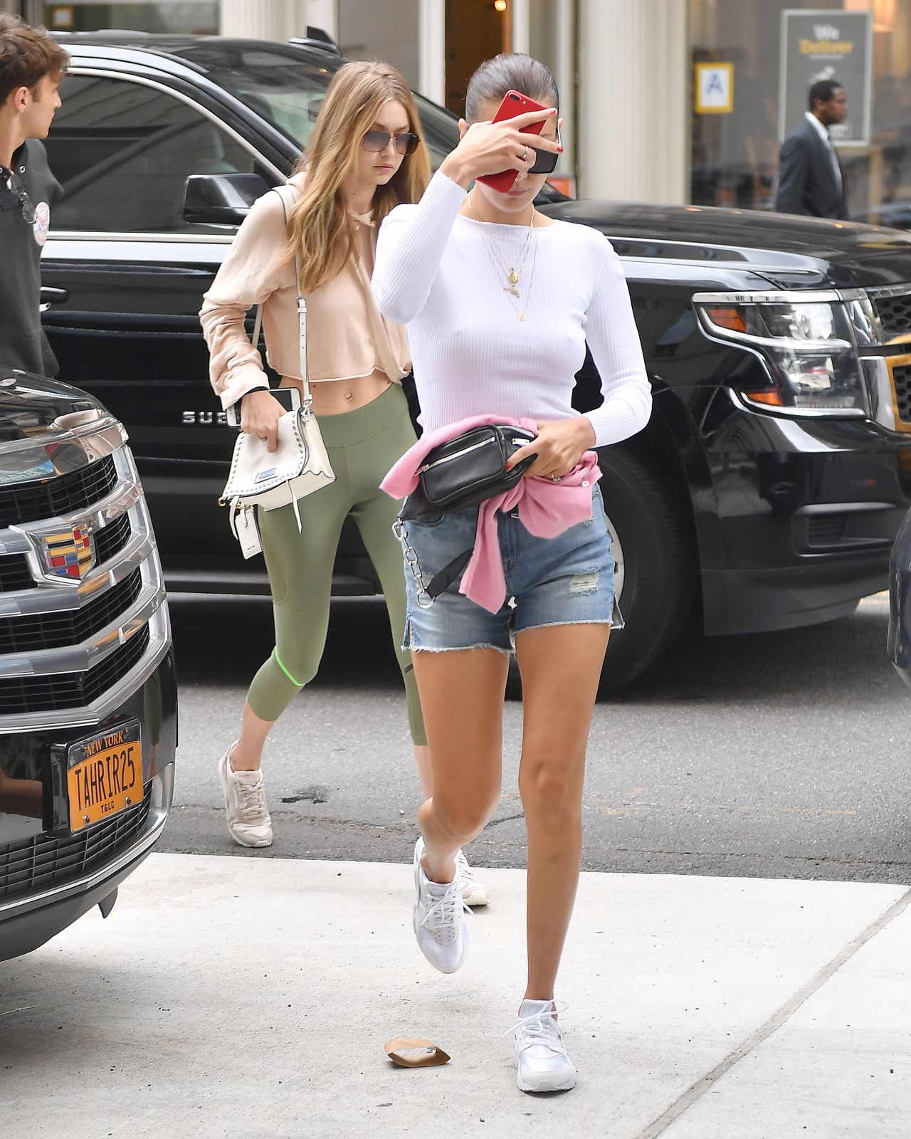 Gigi Hadid and Bella Hadid - Outside Gigi's Apartment in NYC 07/27/2017 ...