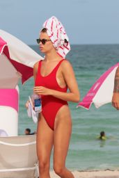Hailey Clauson in a Baywatch Inspired Red Swimsuit - Beach in Miami 07/23/2017