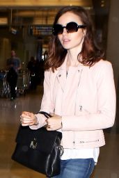 Lily Collins - LAX Airport in Los Angeles, CA 07/01/2017