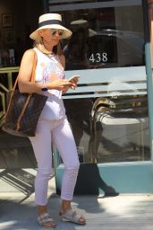 Lori Loughlin Checking Her Phone - Leaves Anastasia Salon in Beverly Hills 07/26/2017