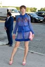 Milla Jovovich - Arrives at Mui Mui Fashion Show at Paris Fashion Week 07/02/2017