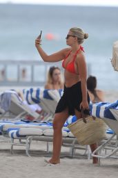 Natasha Oakley in Red Bikini Joins Davin Brugman at Miami Beach 07/18/2017