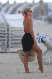 Natasha Oakley in Red Bikini Joins Davin Brugman at Miami Beach 07/18/2017