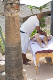 Bethenny Frankel in Swimsuit - Enjoys a Massage at the Beach in Ibiza 08/25/2017