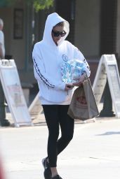 Charlotte McKinney in Tights - Buying Water at Supermarket in Malibu 08/19/2017