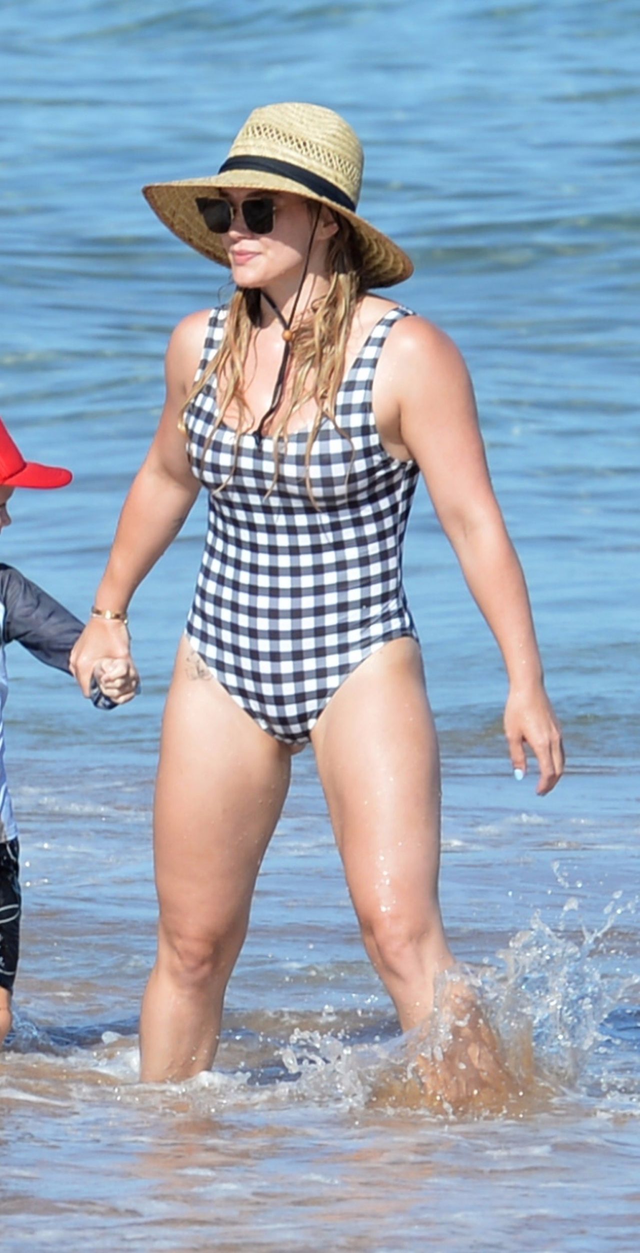 Hilary Duff in a Swimsuit - Beach in Hawaii 08/02/2017.
