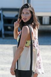 Olivia Munn in a Low-Cut Floral Print Dress - "Buddy Games" Set in Vancouver 08/16/2017