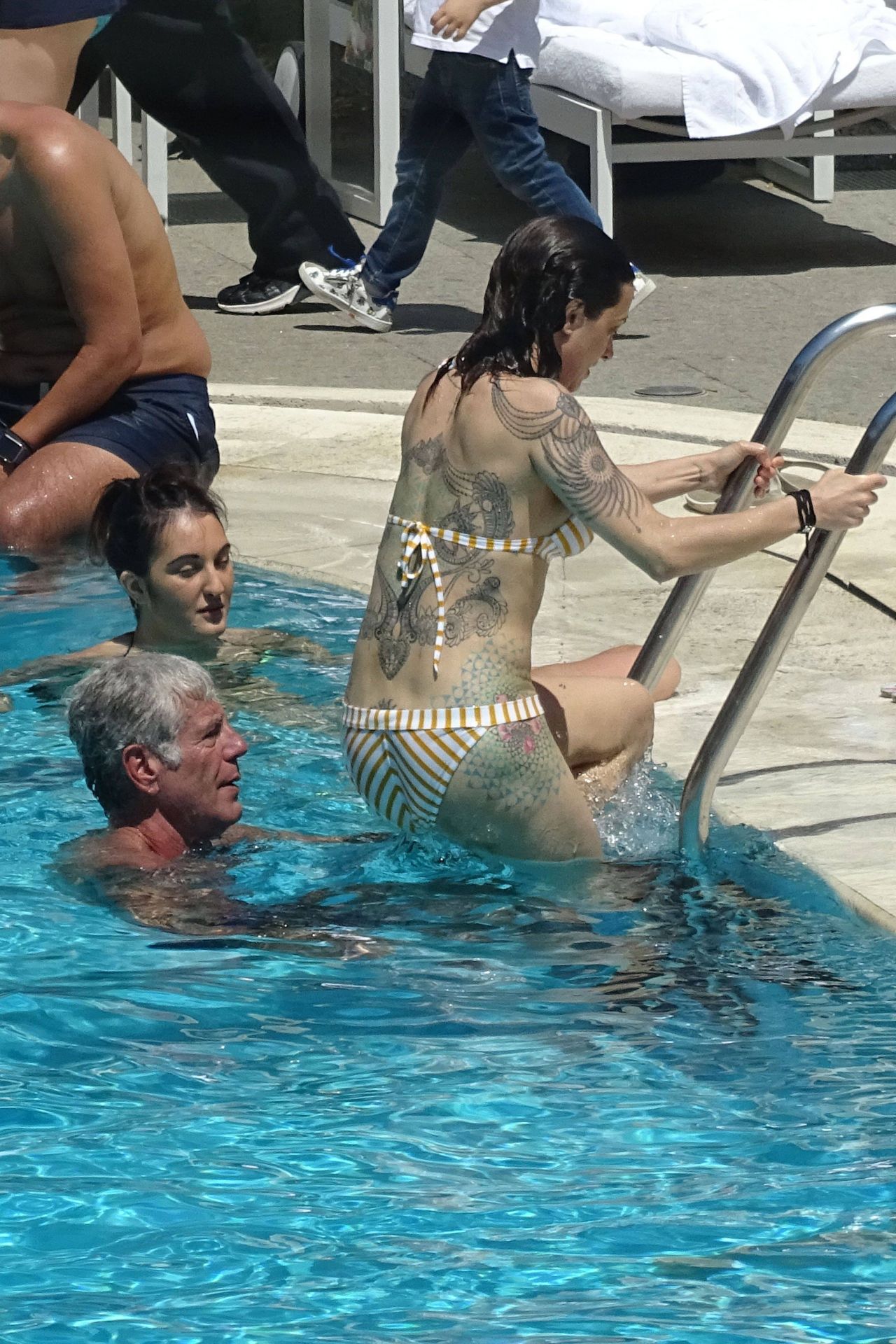 Asia Argento in Bikini at the Hotel Hilton’s Swimming Pool in Rome.