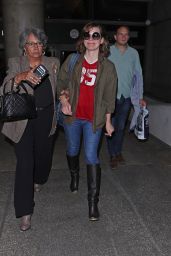 Milla Jovovich Casual Style - LAX Airport in Los Angeles 09/22/2017