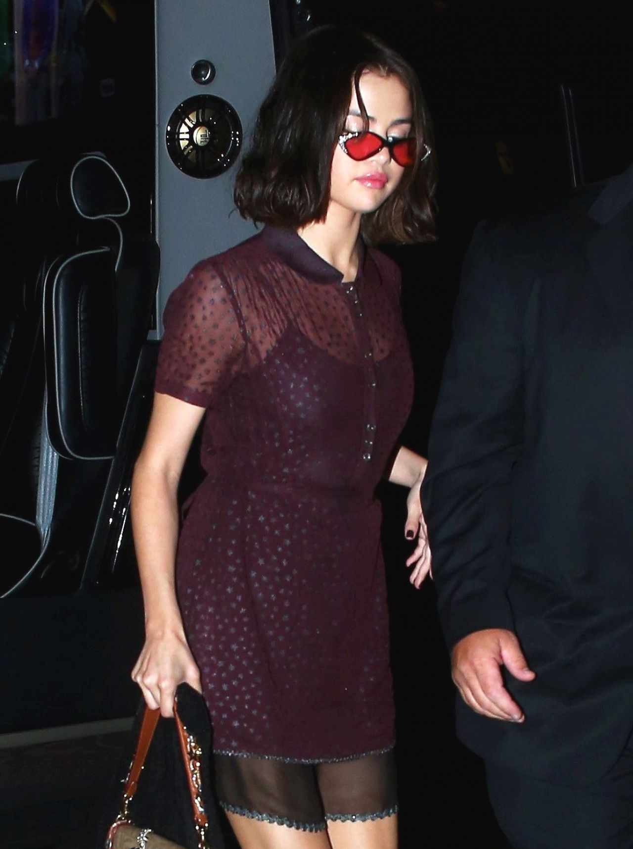 Selena Gomez's Purple & Pinstriped Outfits In NYC: See Photos