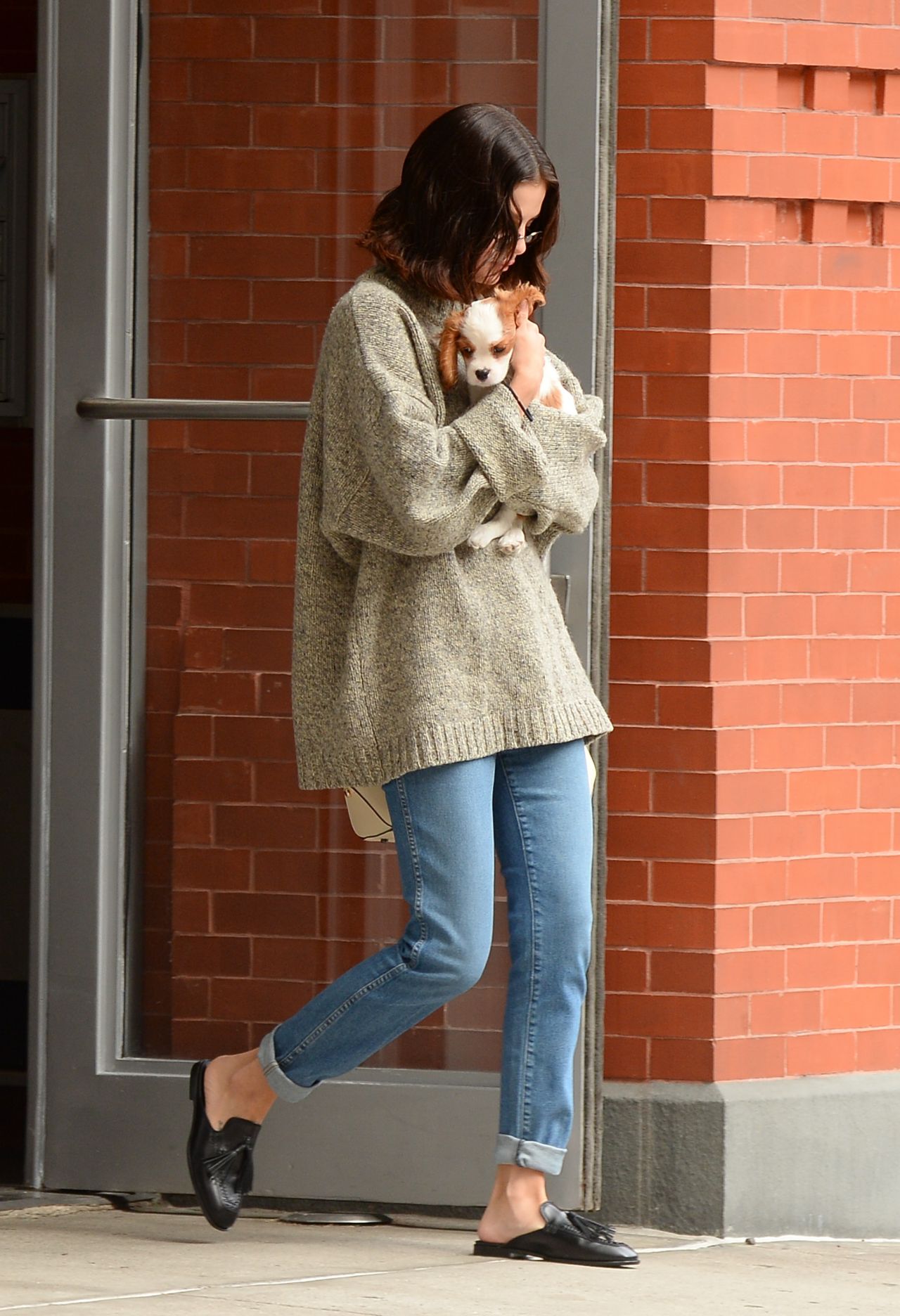 Selena Gomez - With Her Puppy in Soho, NYC 09/20/2017 • CelebMafia