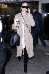 Chrissy Teigen in Travel Outfit - LAX Airport in LA 10/06/2017