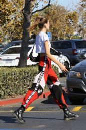Kaia Gerber in Bottoms by I. Am. Gia With a Classic White Crop Top