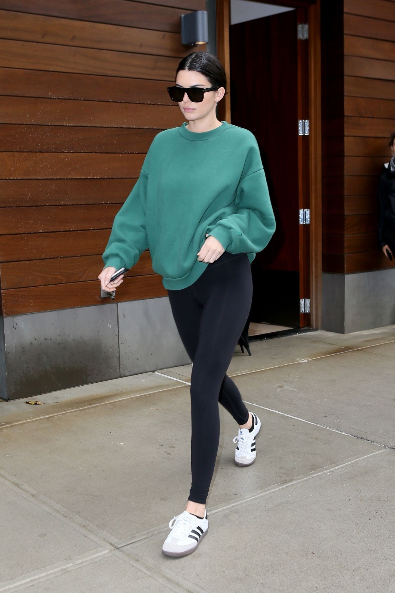 Kendall Jenner - Wearing Black Leggings and a Green Sweatshirt in NYC ...